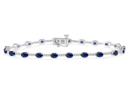 1 3 Ctw Round Cut Diamond & 4x3MM Oval Cut Sapphire Precious Bracelet in 10K White Gold Cheap